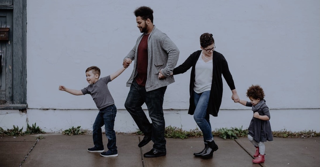 a family walking down the street