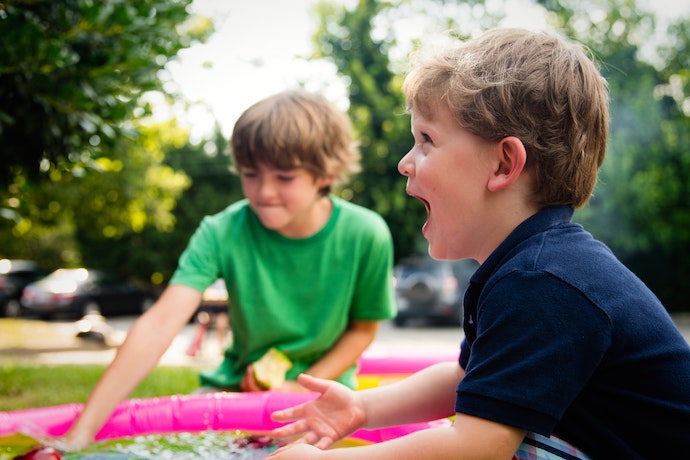2 small boys have fun at camp
