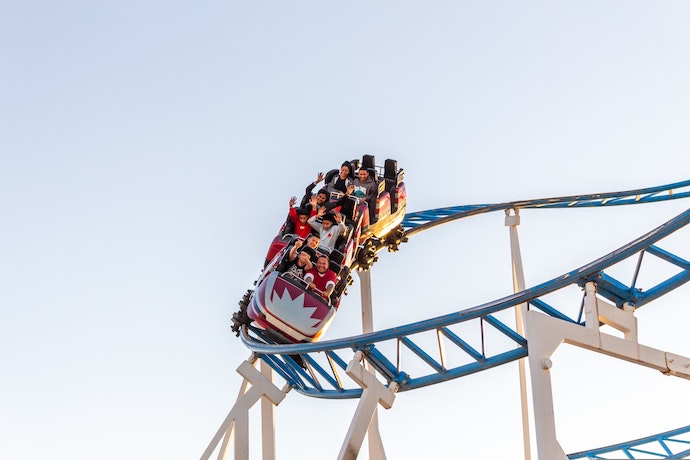 a rollercoaster twists on the track