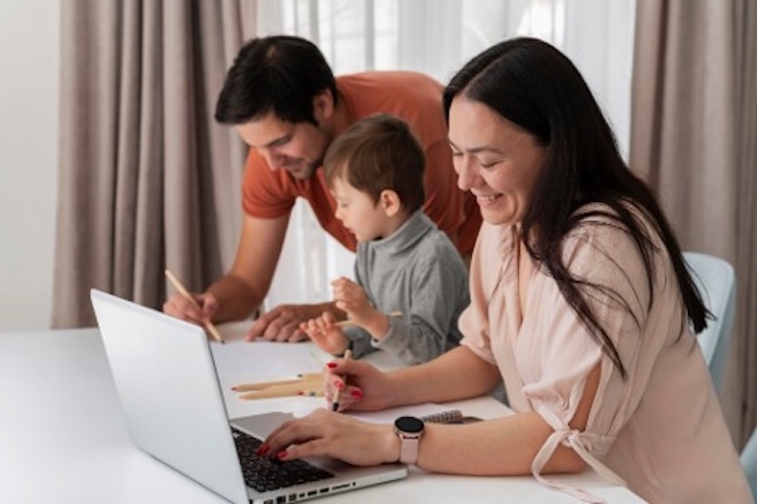 young family at laptop