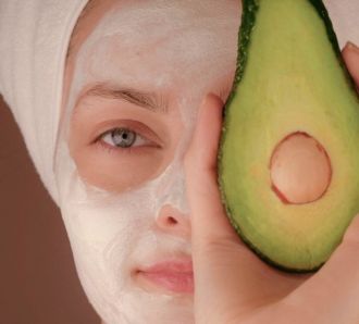 woman applying skincare regime