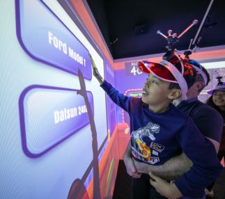 Boy playing Electric Gamebox