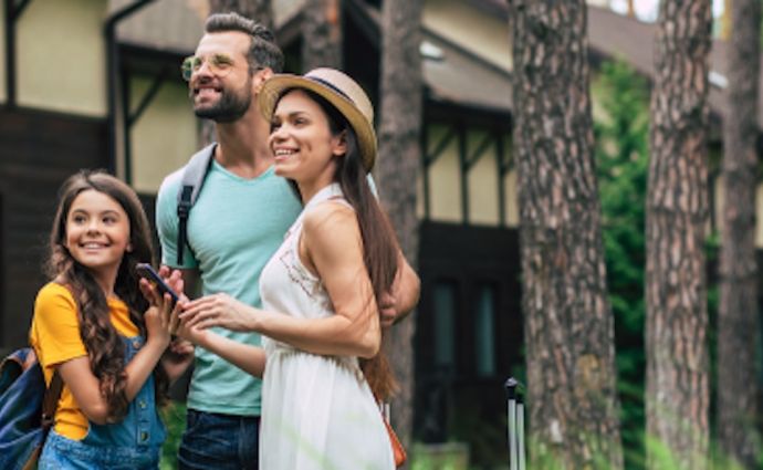 family outside a house