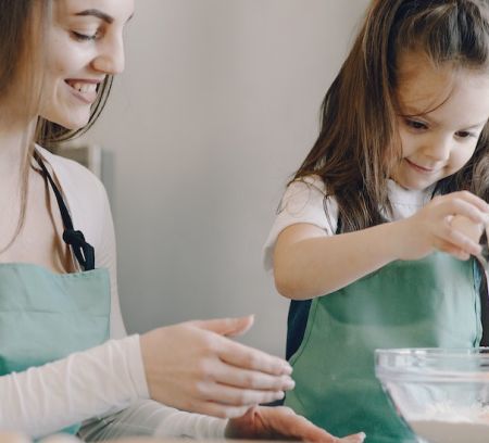 9 Indoor Activities for Keeping Kids Engaged and Learning mother cooking with daughter baking family days out
