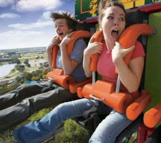 a couple scream on  sasquatch ride