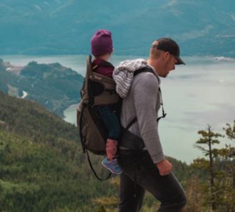 a dad and son on holiday in beautiful surroundings
