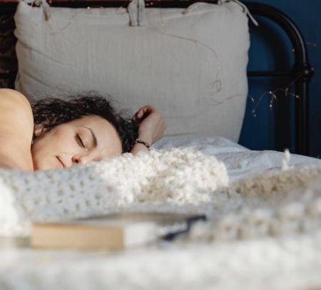 woman sleeping in bed