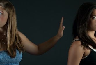 Two teenage girls arguing