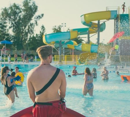 a lifeguard watches over a waterpark