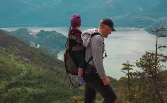 a dad and son on holiday in beautiful surroundings