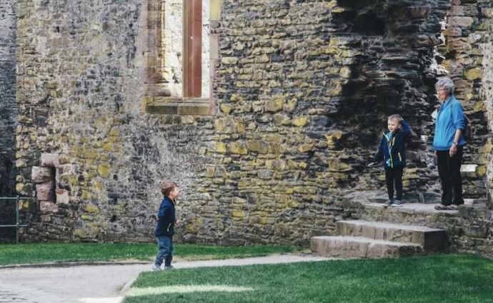 Family visiting castle