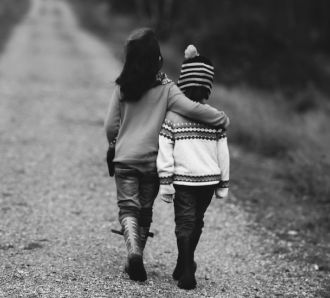 sister cheers up unhappy brother