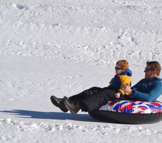big bear snow play snow tubing father son