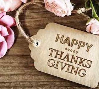 thanksgiving tag on flowers saying Happy Thanksgiving