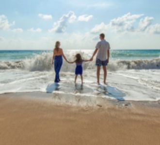Family on beach holiday