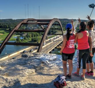 Friends Posing for a Group Selfie at the Pennybacker Bridge Overlook
