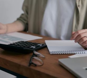 woman at computer doing financials