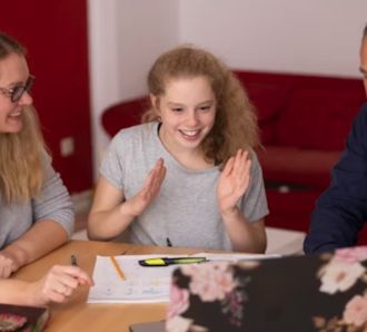 Parents coaching kid for exams