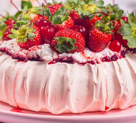 strawberry pavolva covered in strawberries best australian foods