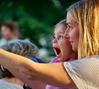 mum and daughter take selfie at concert