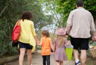 A family walks for a picnic
