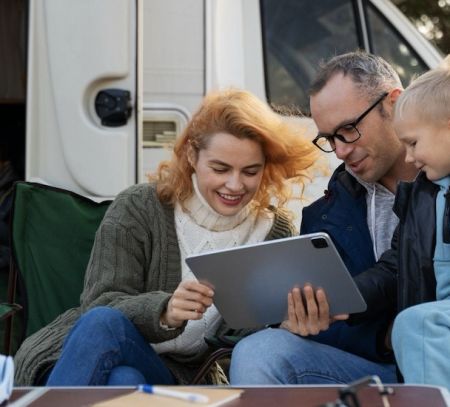 family outside RV