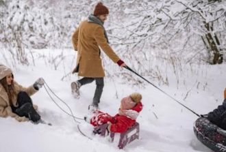 Family play in snow