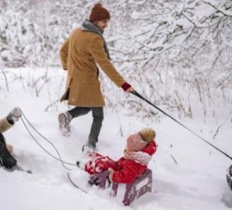 Family play in snow
