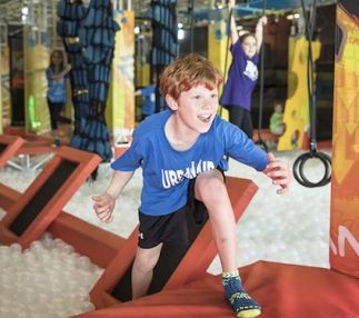urban air adventure park Bloomington Illinois active fun for kids indoor trampolining USA