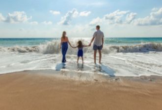 Family on beach holiday