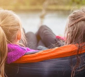 2 girls in a hammock