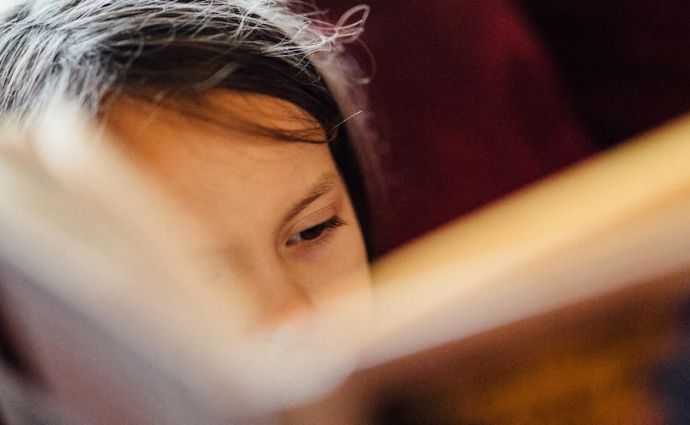 kid reading book