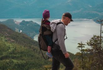 a dad and son on holiday in beautiful surroundings