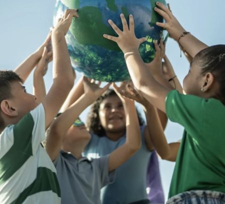 kids holding a globe