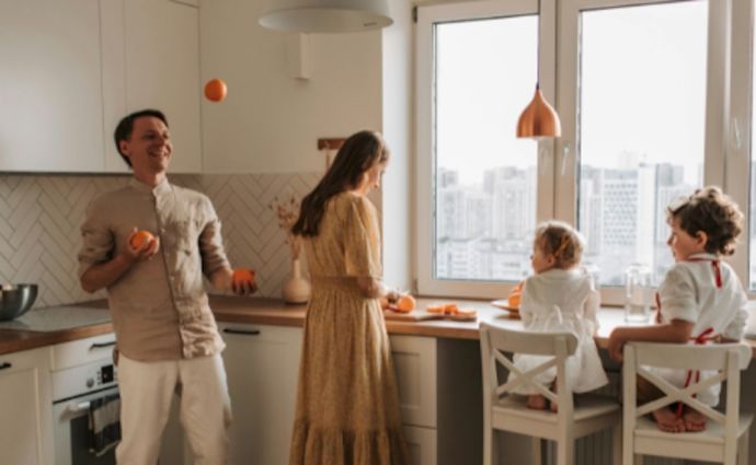 a family play at breakfast