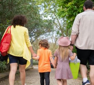 A family walks for a picnic