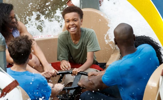 Family having fun on water attraction